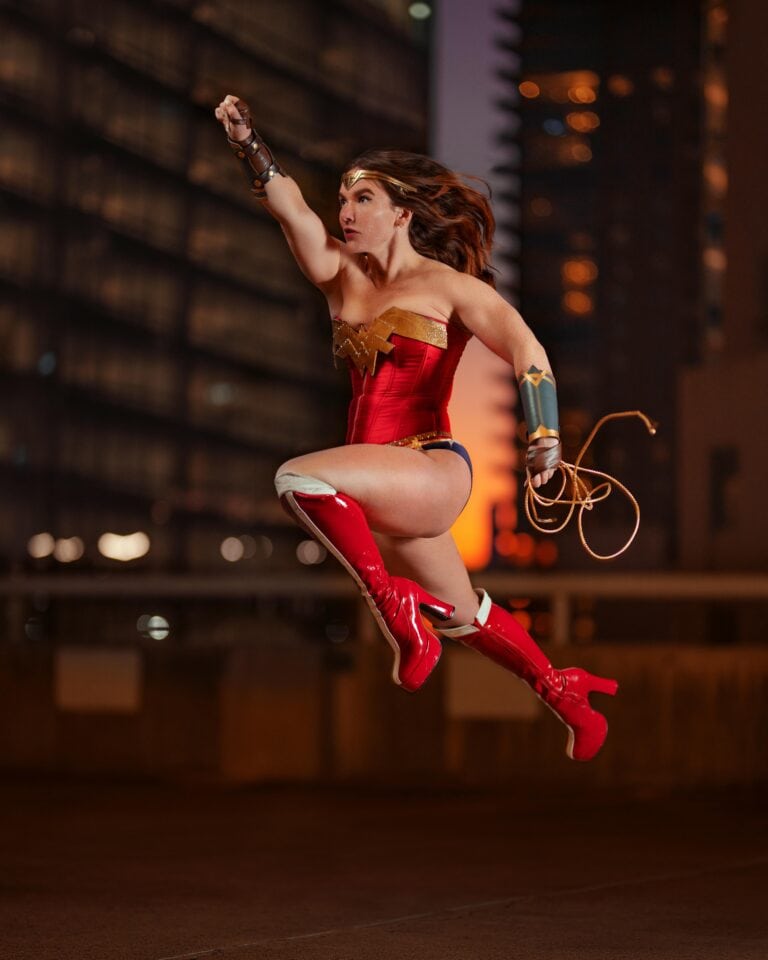Are yyou weak? Are you strong? A photo of superwoman mid-leap.