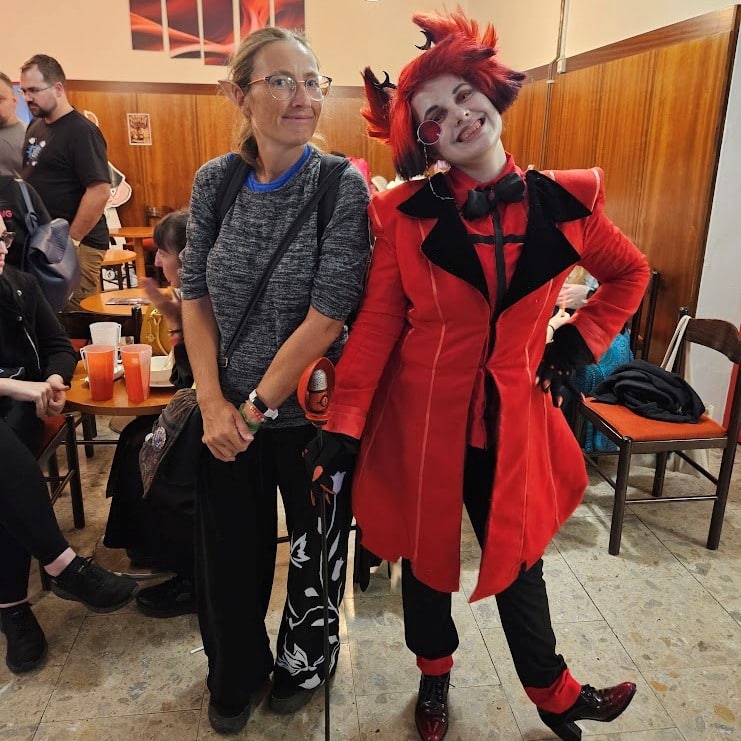 Festival of Imagination - photo with cosplayer fofAlastor from Hazbin Hotel.
